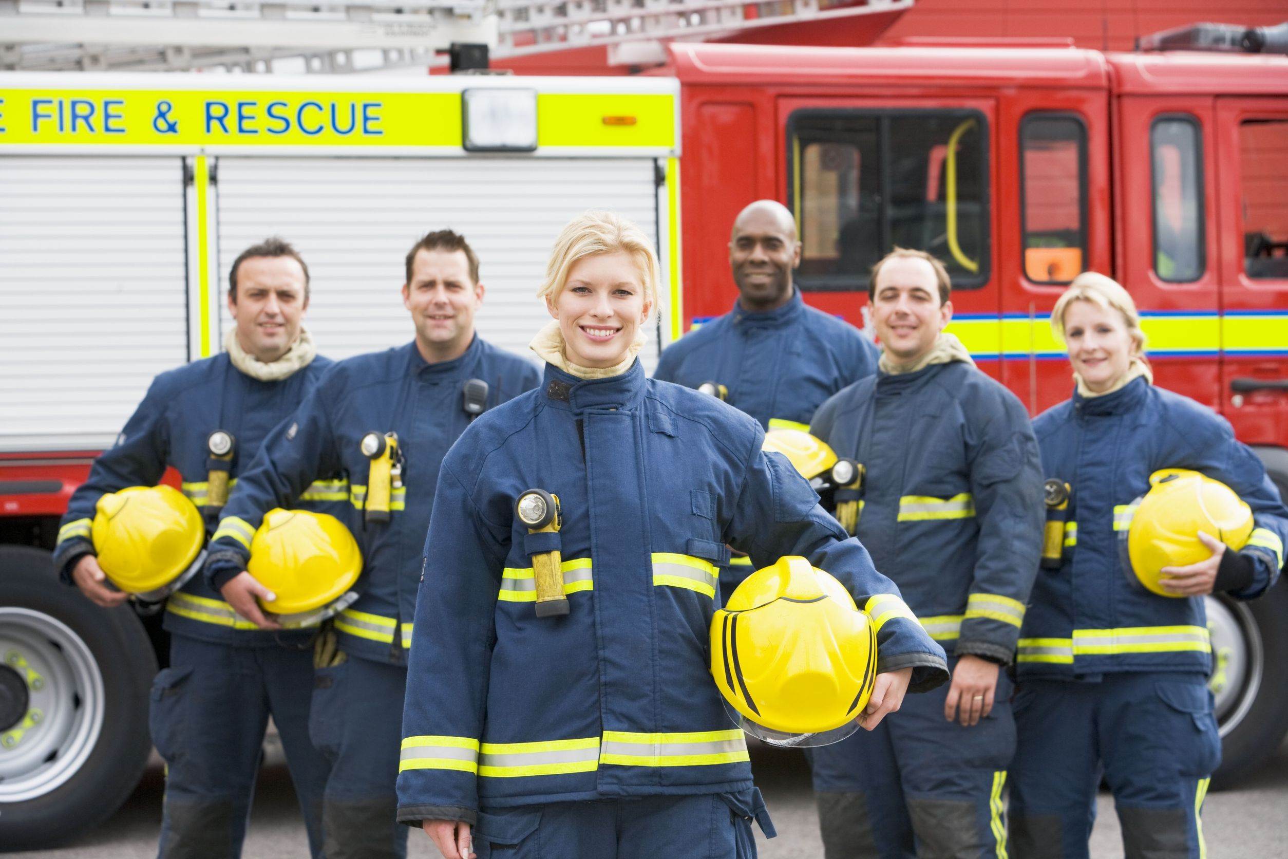 3207705 – six firefighters standing by fire engine Fire Science