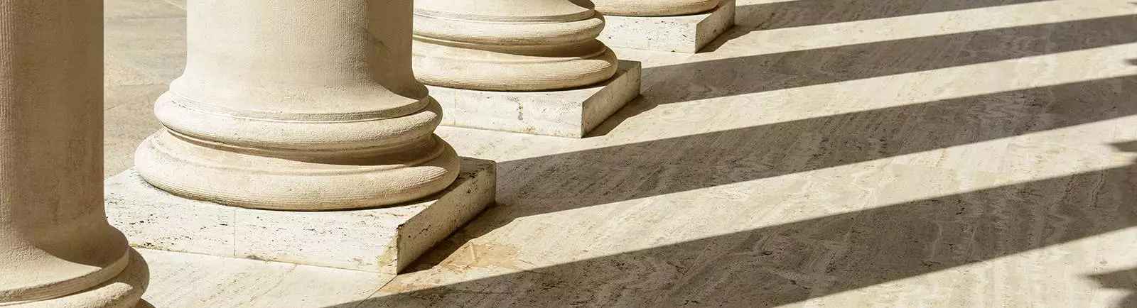 columns with shadows on floor