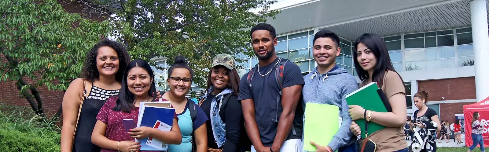 group of diverse students in front of OCC's student center