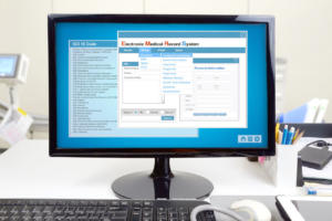 Electronic Medical Record desktop computer with medical record program open
