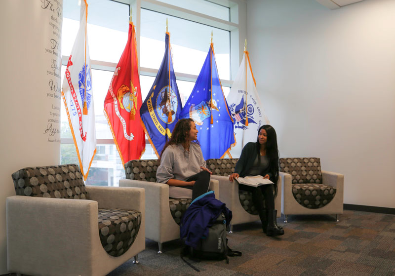 two women sitting in the veterans resource lounge