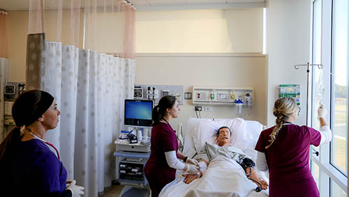 Nursing Students working in a hospital.