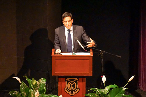 Dr. Sanjay Gupta speaking at a podium