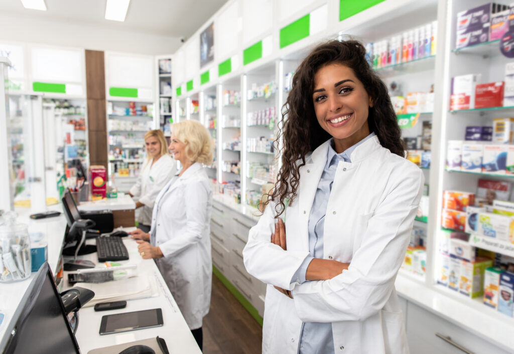 Pharmacy Tech Portrait of female pharmacist in drugstore.