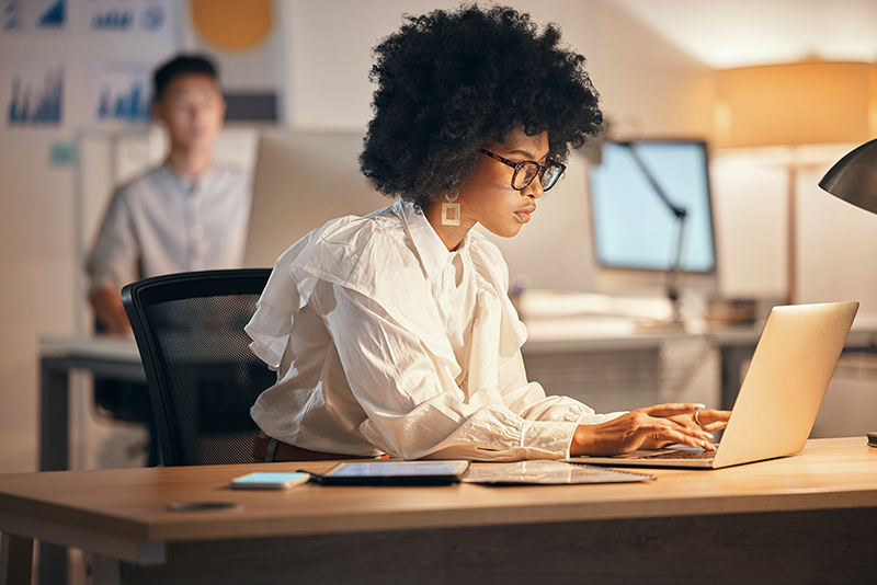 Professional woman working on laptop