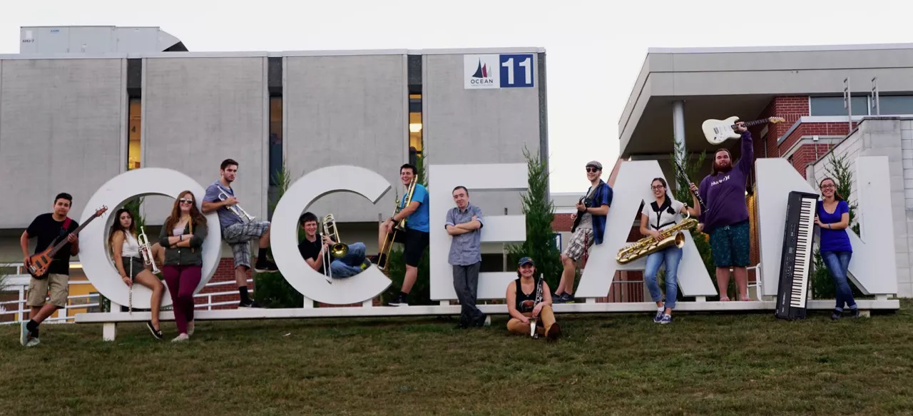 jazz band members on the Ocean sign