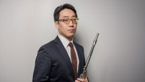 Beomjae Kim holding a flute