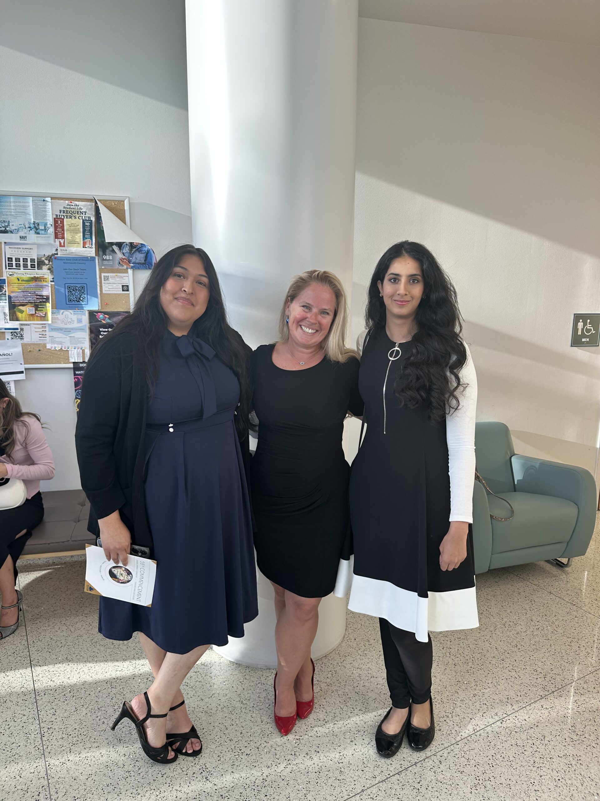 Three EOF students posing together