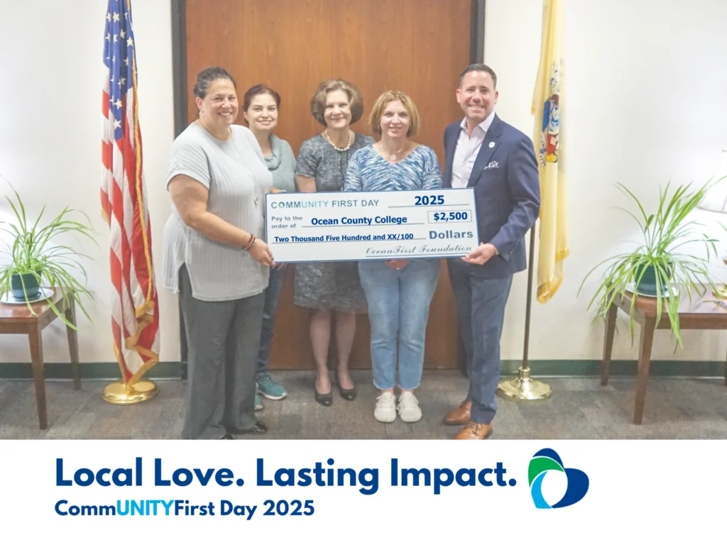 Local Love. Lasting Impact. CommUNITYFirst Day 2025 Jan Kirsten, Dr. Monaco, and Ken Malagiere receiving a $2500 check to OCC's Helping Hands from OceanFirst