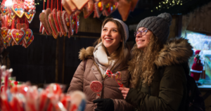 Two women smiling at craft fair