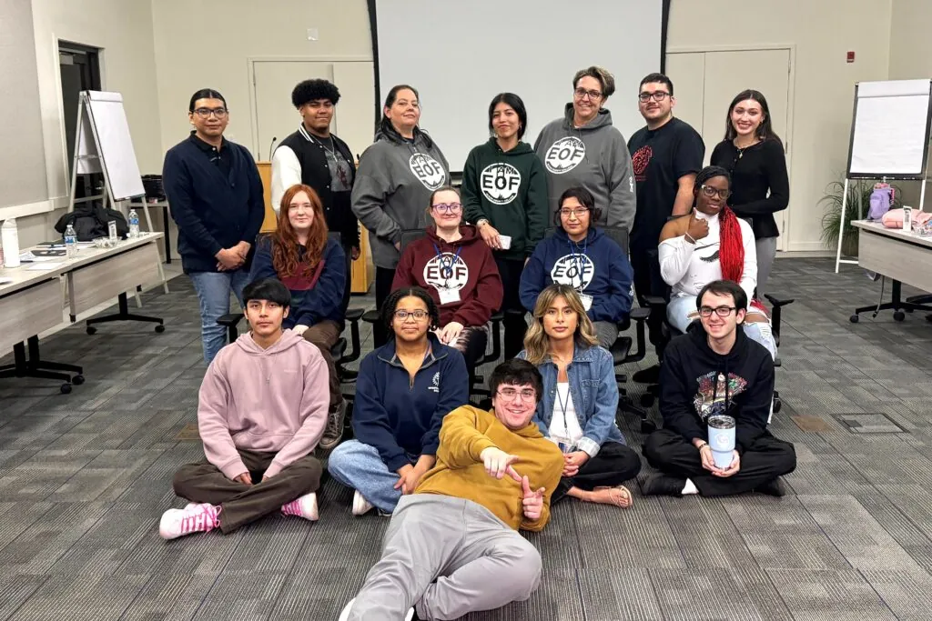 Group of EOF students posed together at a conference. 