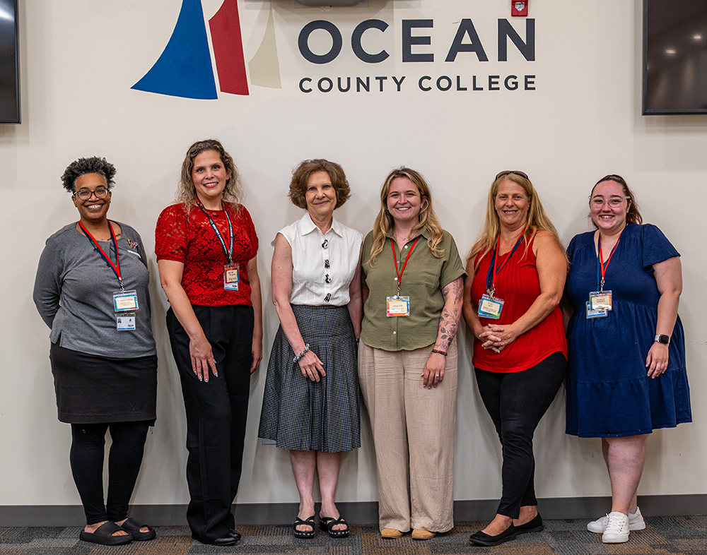 Dr Monaco with college employees at orientation