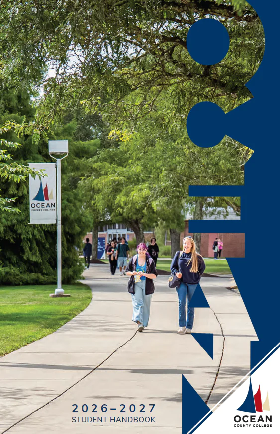 Students walking across campus and smiling.